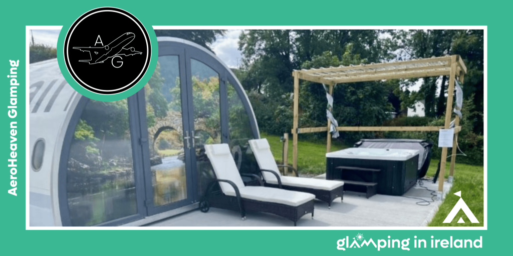 Image showing a converted aeroplane to glamping pod with sun loungers on a patio area.
